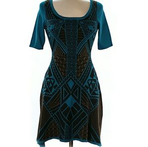 Blue, black and gold patterned sweater dress